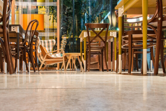 Interior dining room showcasing a beautiful Stained Concrete floor